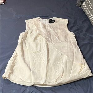 Elegant Ivory Sleeveless Blouse by